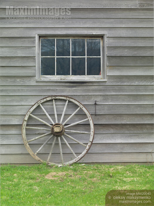 Stock photo of Old Wheel Buy commercial use license at MaximImages