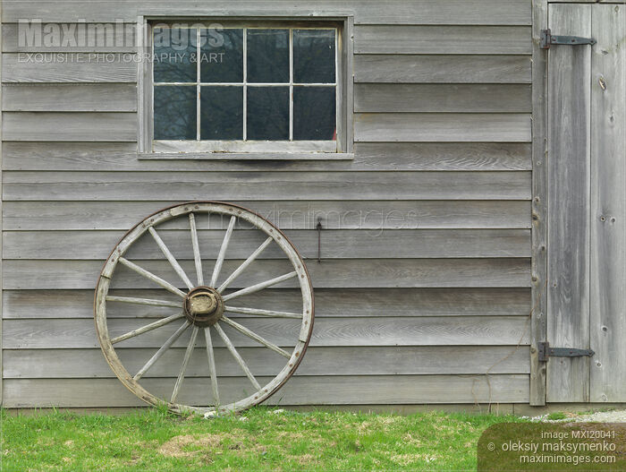 Stock photo of Old Wheel Buy commercial use license at MaximImages