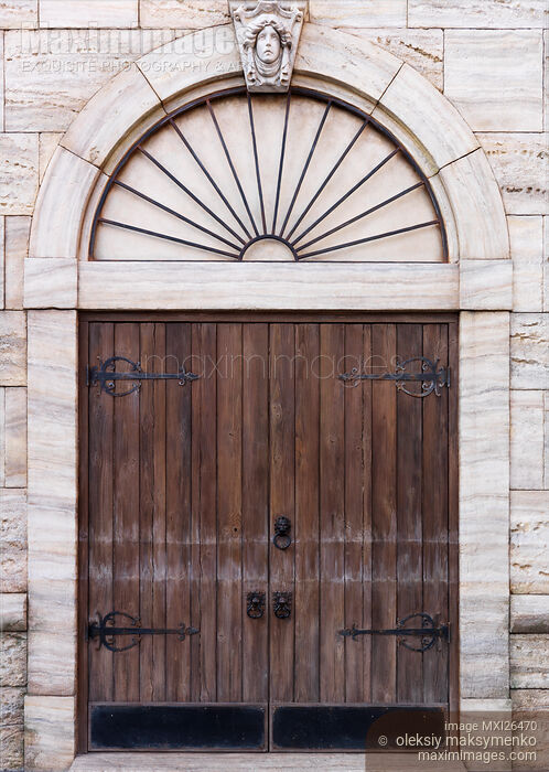 Stock photo of Old wooden door of Venetian building Buy commercial use license at MaximImages