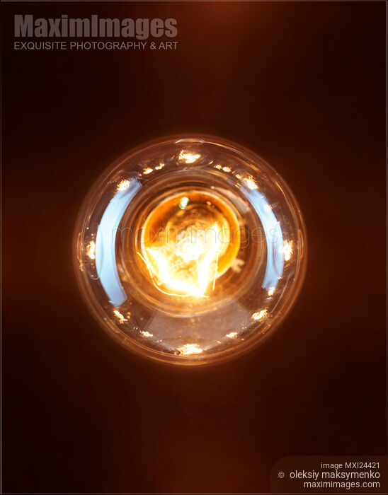 One lit incandescent light bulb Stock photo of One lit incandescent light bulb Buy commercial use license at MaximImages