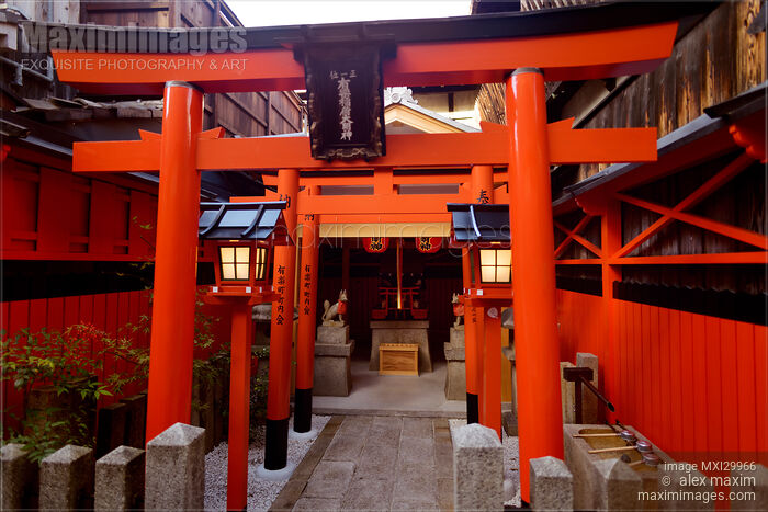 Stock photo of Orange Torii of a small Inari Shinto shrine in Kyoto Buy commercial use license at MaximImages