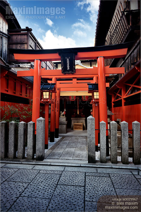 Stock photo of Orange Torii of little Inari Shinto shrine in Kyoto Buy commercial use license at MaximImages