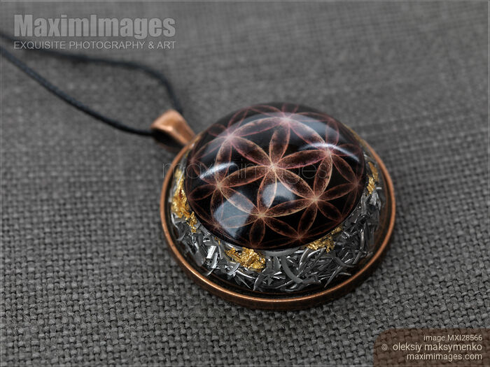Stock photo of Orgonite necklace stone Buy commercial use license at MaximImages