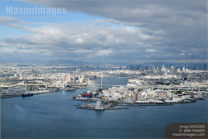 Osaka Bay waterfront Osaka city skyline Tempozan bridge in aerial city scenery Japan Stock photo of Osaka Bay waterfront Osaka city skyline Tempozan bridge in aerial city scenery Japan Buy commercial use license at MaximImages