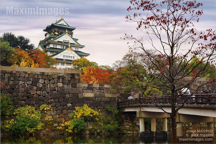 Stock photo of Osaka Castle and Gokurakubashi bridge over canal in beautiful colorful autumn scenery Buy commercial use license at MaximImages