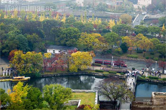 Osaka Castle Park canal with boats Gokurakubashi bridge over the moat and sightseeing train aerial autumn scenery Stock photo of Osaka Castle Park canal with boats Gokurakubashi bridge over the moat and sightseeing train aerial autumn scenery Buy commercial use license at MaximImages