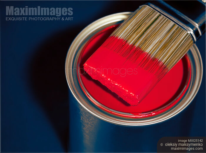 Stock photo of Paintbrush on can with red paint Buy commercial use license at MaximImages