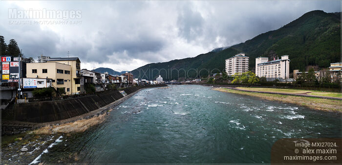 Stock photo of Panorama of Hida river and mountains in Gero Japan Buy commercial use license at MaximImages