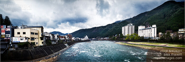Stock photo of Panorama of Hida river and mountains in Gero Japan Buy commercial use license at MaximImages