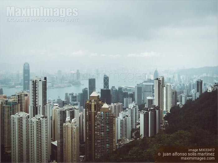 Stock photo of Panoramic scenery of Hong Kong city in China with high-rise modern buildings Buy commercial use license at MaximImages