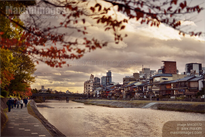 Pathway along Kamo River in a beautiful dramatic autumn sunset scenery in Kyoto Stock photo of Pathway along Kamo River in a beautiful dramatic autumn sunset scenery in Kyoto Buy commercial use license at MaximImages