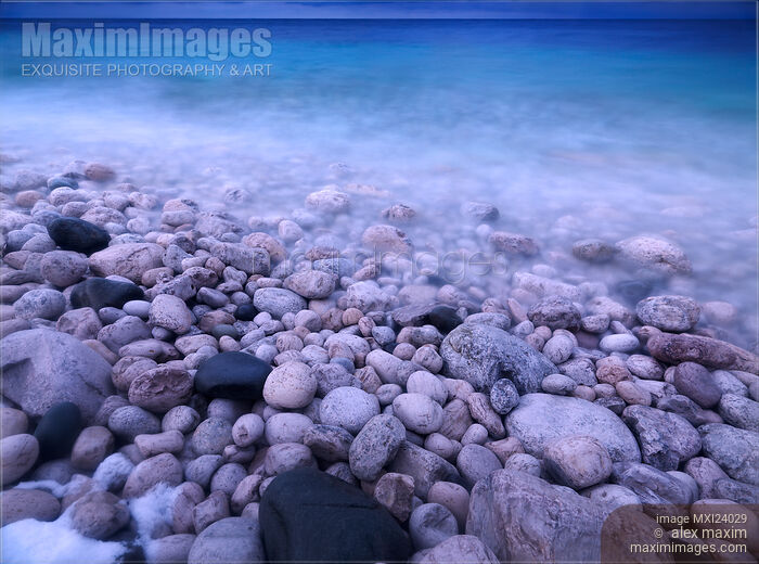 Stock photo of Pebble shore of Georgian Bay in winter Buy commercial use license at MaximImages