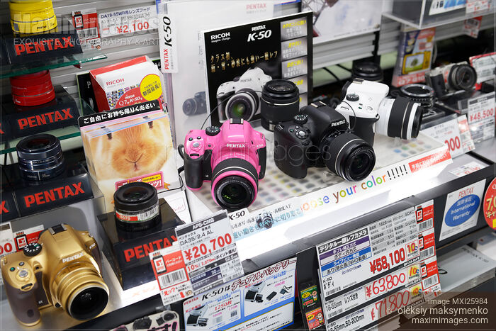 Stock photo of Pentax cameras on store display Buy commercial use license at MaximImages