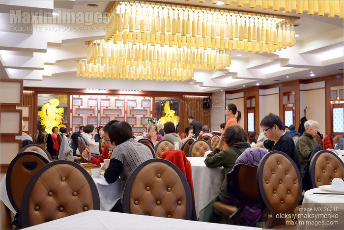 Stock photo of People at a Chinese restaurant Buy commercial use license at MaximImages