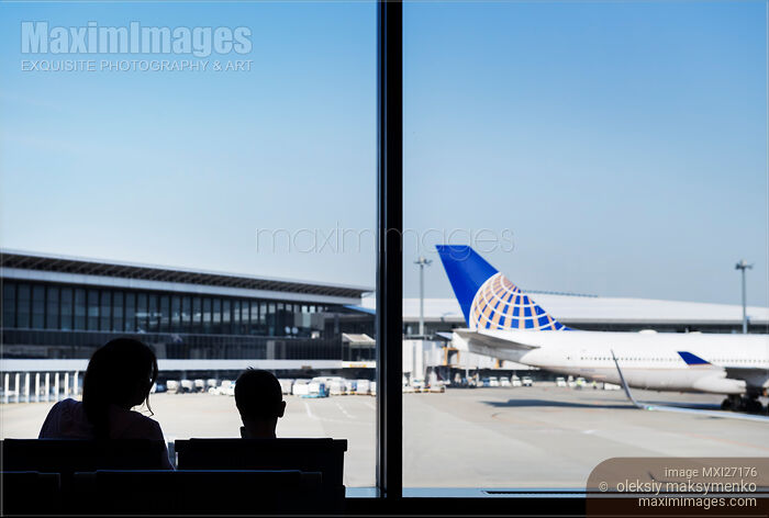 Stock photo of People at airport waiting for their flight Buy commercial use license at MaximImages