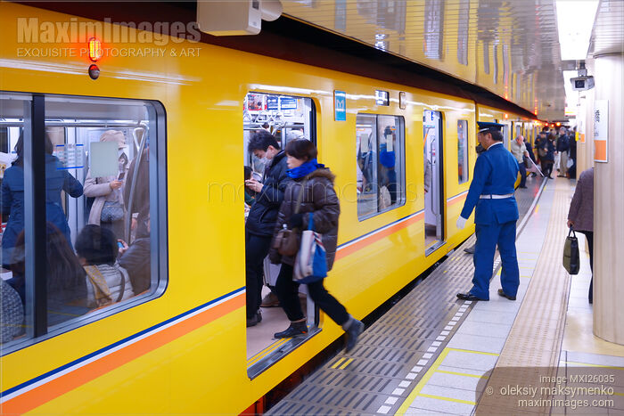 Stock photo of People entering subway train in Japan Buy commercial use license at MaximImages