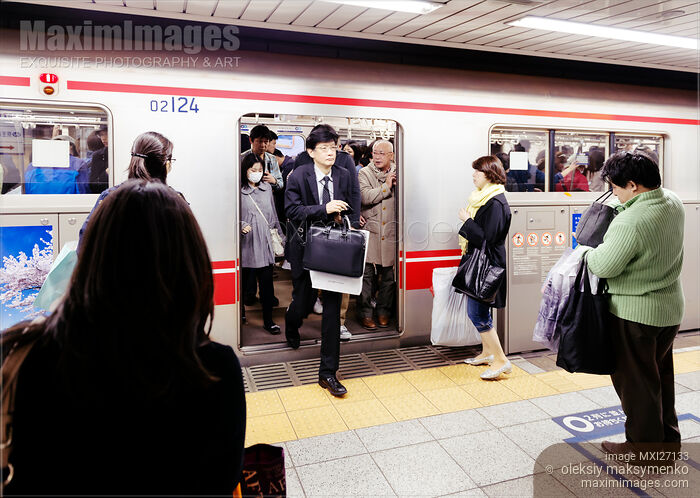 People exiting a subway train in Tokyo Stock photo of People exiting a subway train in Tokyo Buy commercial use license at MaximImages