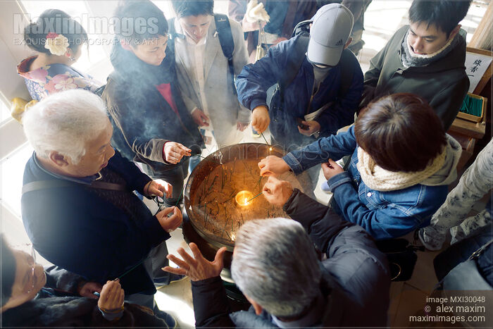 People incense at Kiyomizu-dera Buddhist temple in Kyoto Japan Stock photo of People incense at Kiyomizu-dera Buddhist temple in Kyoto Japan Buy commercial use license at MaximImages