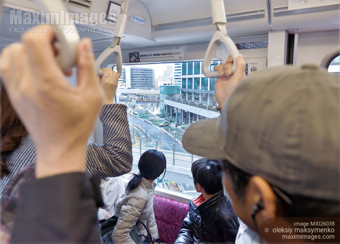People on a train Tokyo Japan Stock photo of People on a train Tokyo Japan Buy commercial use license at MaximImages