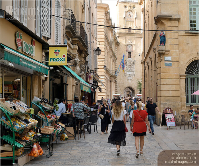 Stock photo of People on the streets of Aix-en-Provence city in Southern France Buy commercial use license at MaximImages