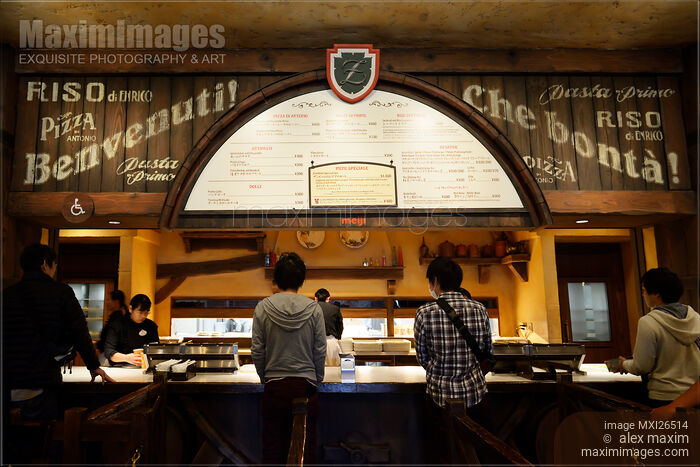 Stock photo of People ordering food in restaurant Buy commercial use license at MaximImages