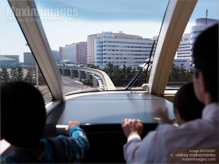 Stock photo of People riding Disney Resort Line monorail train in Tokyo Buy commercial use license at MaximImages
