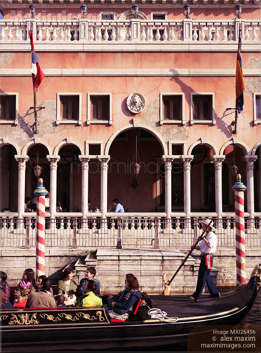 People riding Venetian gondola at Tokyo Disneysea Stock photo of People riding Venetian gondola at Tokyo Disneysea Buy commercial use license at MaximImages