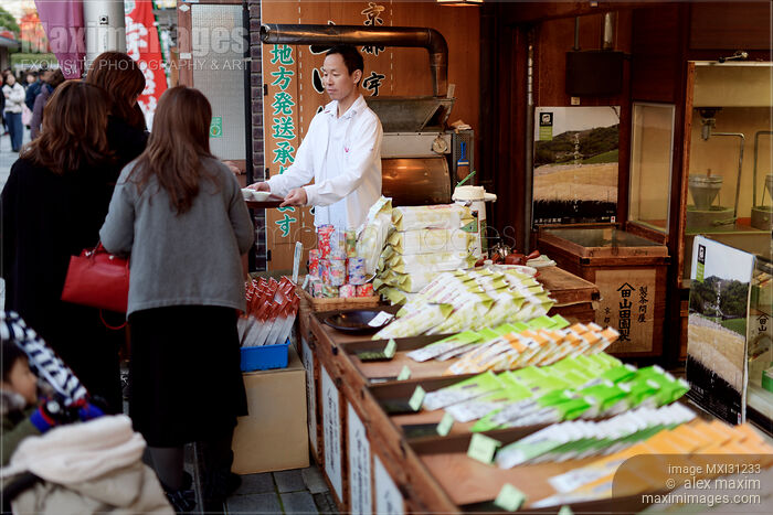 Stock photo of People sampling green tea at a tea shop in Japan Buy commercial use license at MaximImages