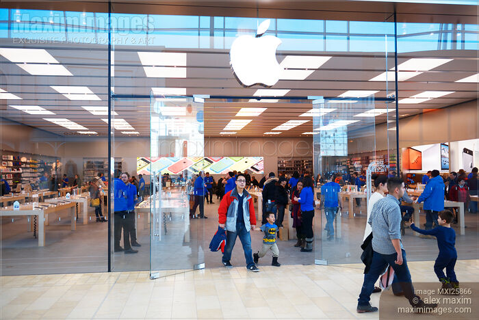 Stock photo of People shopping at Apple store in Canada Buy commercial use license at MaximImages