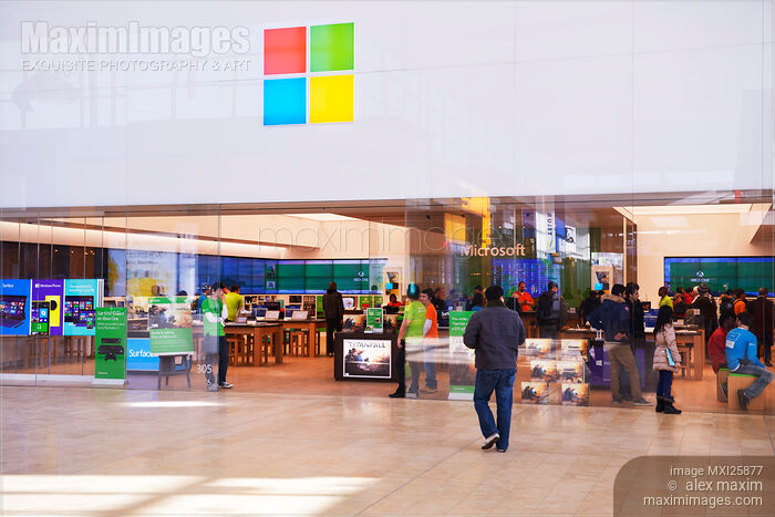 Stock photo of People shopping at Microsoft store in Canada Buy commercial use license at MaximImages