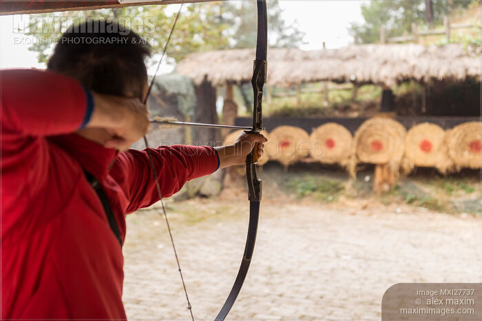 Stock photo of Person practicing archery in China Buy commercial use license at MaximImages