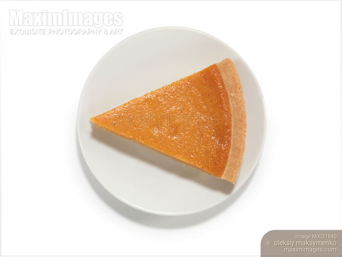 Stock photo of Piece of Pumpkin Pie on a Saucer Buy commercial use license at MaximImages