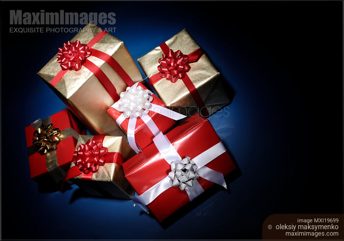 Stock photo of Pile of Christmas Gifts Buy commercial use license at MaximImages