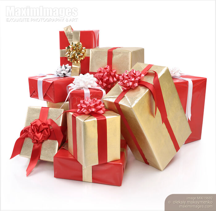 Pile of Christmas gifts wrapped in red and gold Stock photo of Pile of Christmas gifts wrapped in red and gold Buy commercial use license at MaximImages