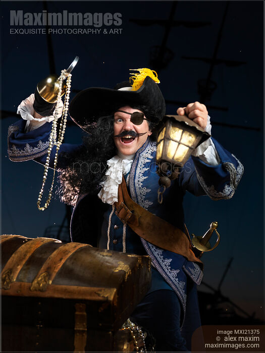 Stock photo of Pirate with a Treasure Chest Buy commercial use license at MaximImages