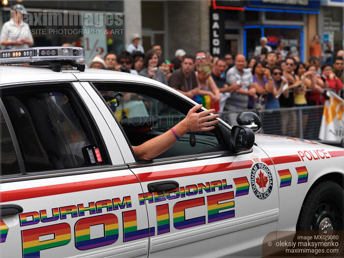 Stock photo of Police at Pride Parade in Toronto Buy commercial use license at MaximImages