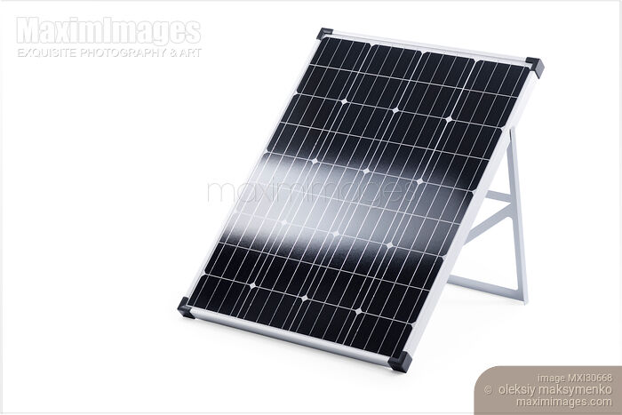 Stock photo of Portable solar panel with crystalline solar cells Buy commercial use license at MaximImages