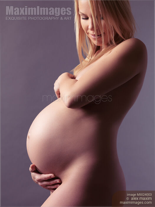 Stock photo of Portrait of a beautiful nude pregnant woman Buy commercial use license at MaximImages