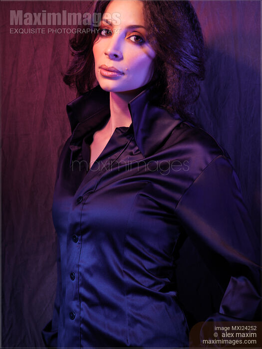 Stock photo of Portrait of a beautiful woman in black shirt Buy commercial use license at MaximImages