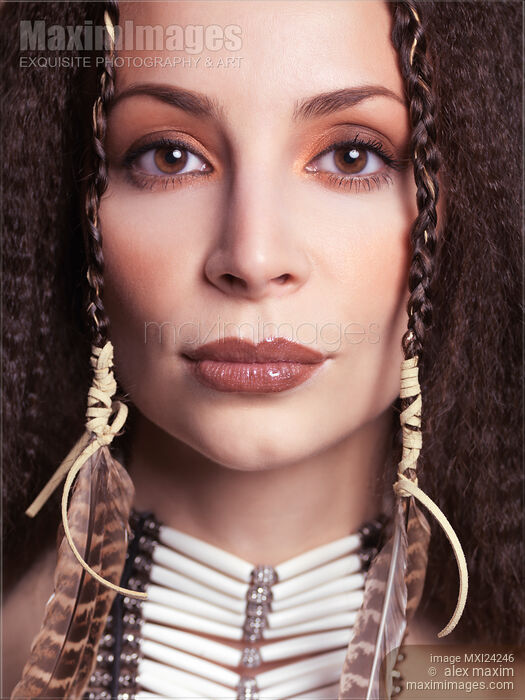 Portrait of a beautiful woman wearing aboriginal accessories Stock photo of Portrait of a beautiful woman wearing aboriginal accessories Buy commercial use license at MaximImages