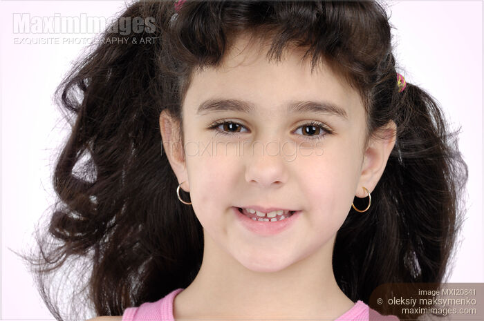 Stock photo of Portrait of a Beautiful Young Girl Buy commercial use license at MaximImages
