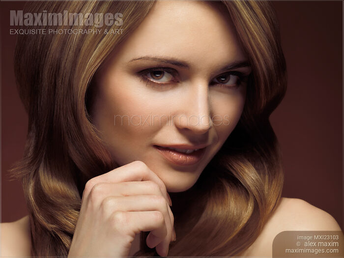 Stock photo of Portrait of a Beautiful Young Woman Buy commercial use license at MaximImages