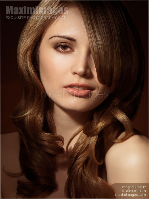 Portrait of a Beautiful Young Woman Stock photo of Portrait of a Beautiful Young Woman Buy commercial use license at MaximImages