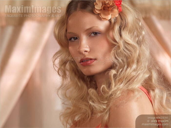 Portrait of a Beautiful Young Woman Stock photo of Portrait of a Beautiful Young Woman Buy commercial use license at MaximImages