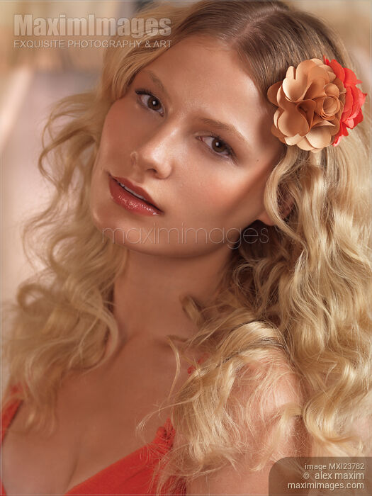 Portrait of a Beautiful Young Woman Stock photo of Portrait of a Beautiful Young Woman Buy commercial use license at MaximImages