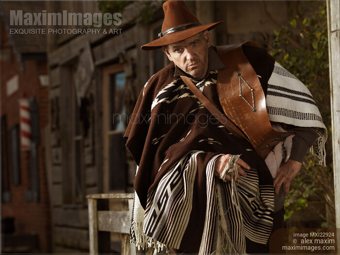 Stock photo of Portrait of a Cowboy Notorious villain in Wild west style Buy commercial use license at MaximImages