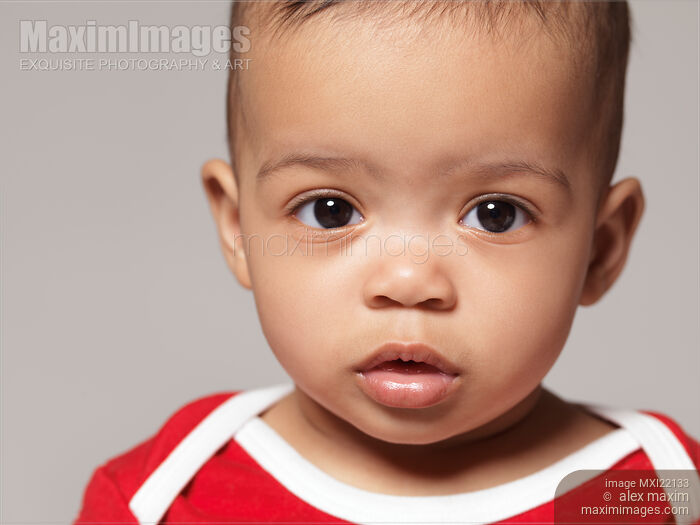 Stock photo of Portrait of a Cute Baby Girl Buy commercial use license at MaximImages