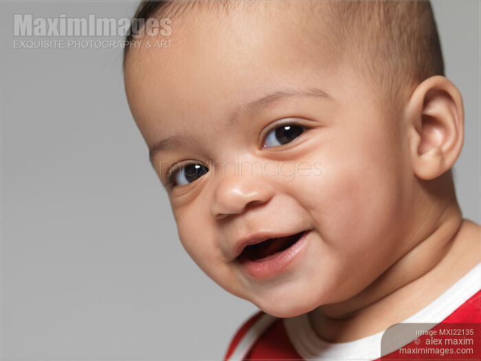 Stock photo of Portrait of a Cute Baby Girl Buy commercial use license at MaximImages