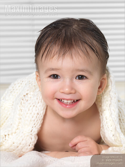 Portrait of a cute smiling child Stock photo of Portrait of a cute smiling child Buy commercial use license at MaximImages