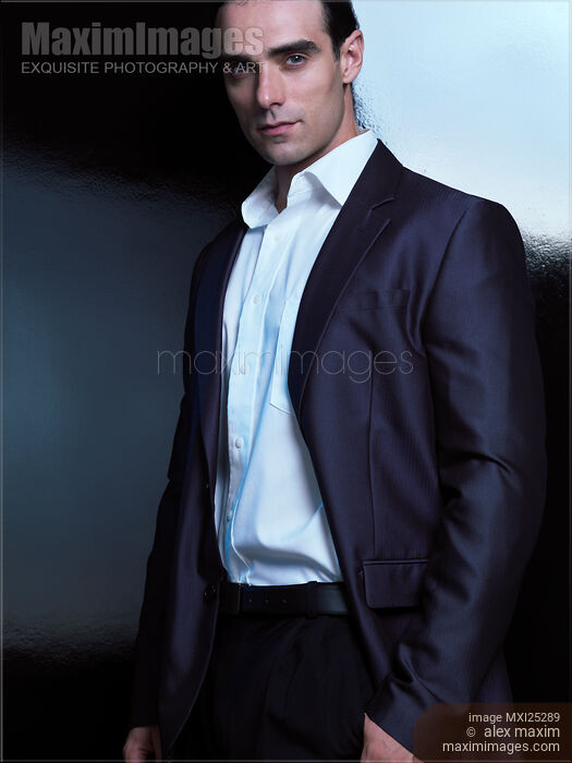 Stock photo of Portrait of a handsome man wearing a suit Buy commercial use license at MaximImages